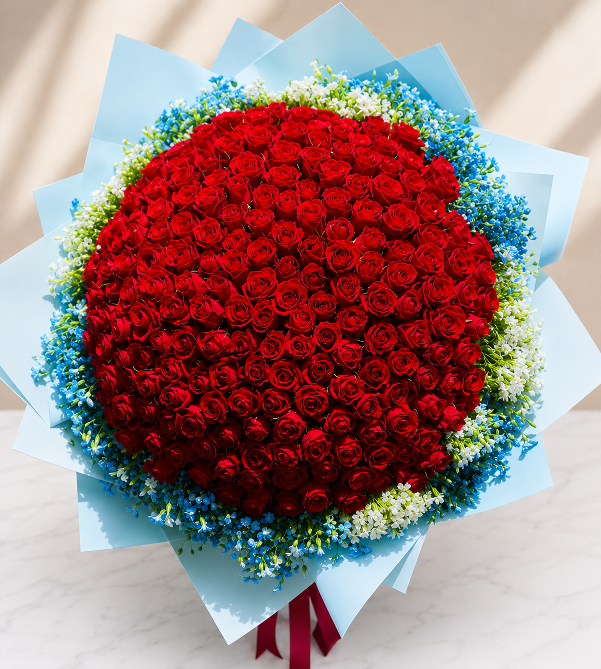 Large luxury Red Flower Bouquet circled with small free and white flowers